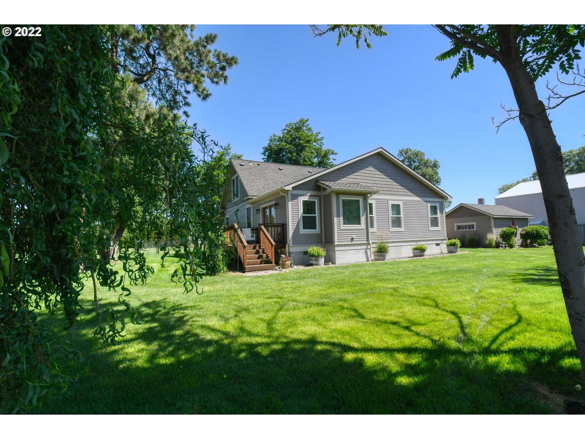 33104 Stage Gulch Road Stanfield, OR 97875 - Photo 26 of 32 a view of house with backyard and garden