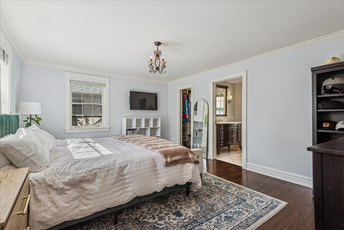 526 Orchard Lane Winnetka, IL 60093 - Photo 13 of 29 a bedroom with a large bed and a window