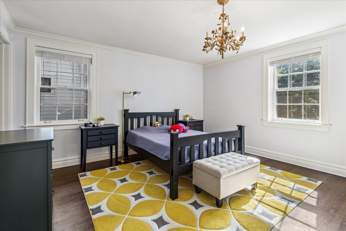 526 Orchard Lane Winnetka, IL 60093 - Photo 17 of 29 a bedroom with furniture and a window