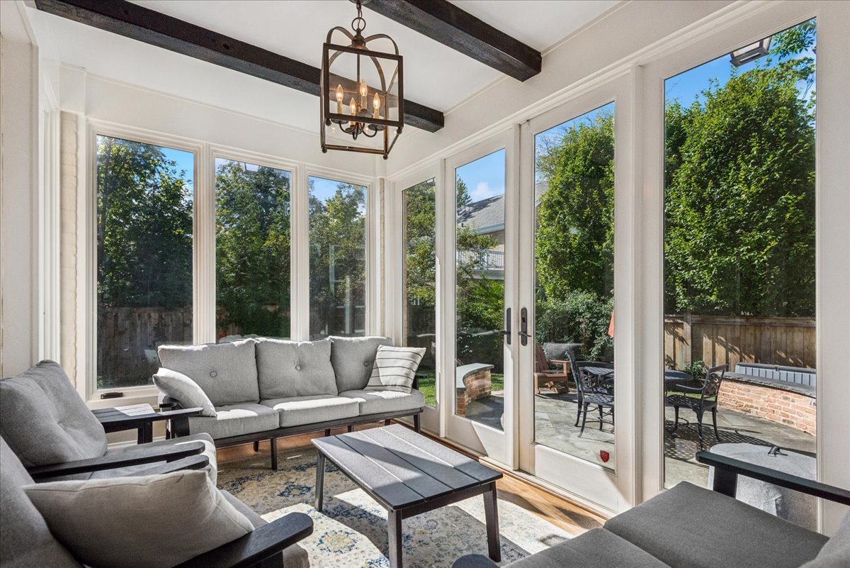 526 Orchard Lane Winnetka, IL 60093 - Photo 7 of 29 a living room with furniture and a chandelier