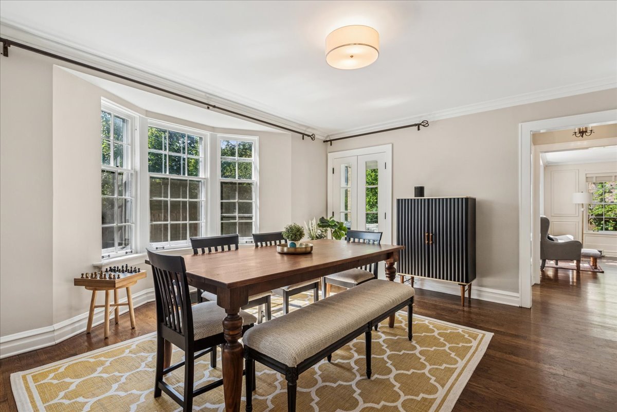 526 Orchard Lane Winnetka, IL 60093 - Photo 9 of 29 a view of a dining room with furniture and wooden floor