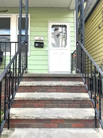 a kitchen with stainless steel appliances granite countertop lots of counter top space and a window