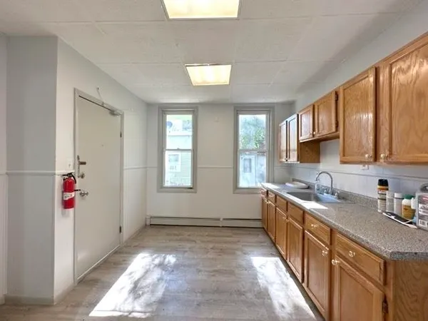 a view of an empty room with a window