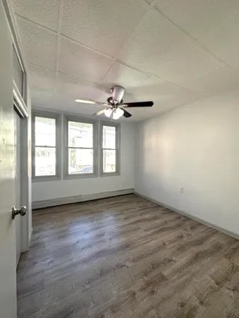 an empty room with windows