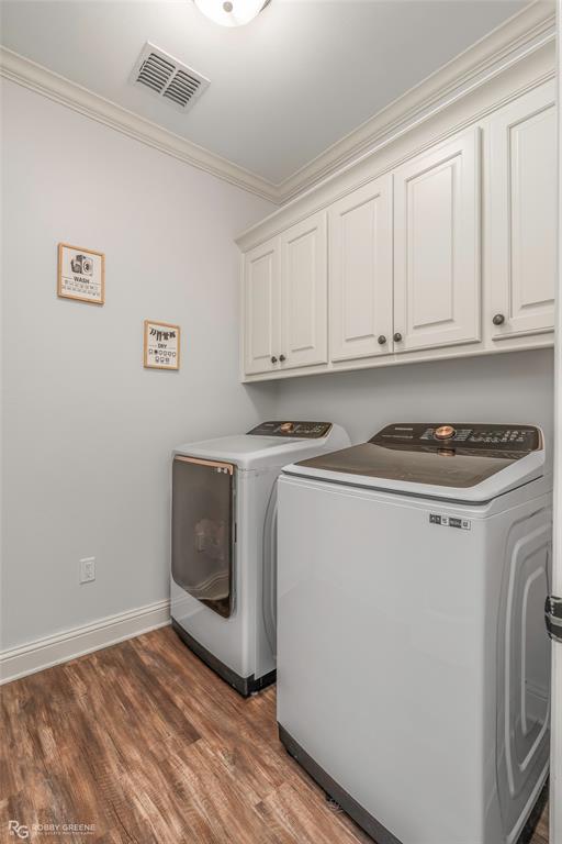 711 Reeds Reef Bossier City, LA 71112 - Photo 29 of 36 a kitchen with granite countertop white cabinets and white appliances