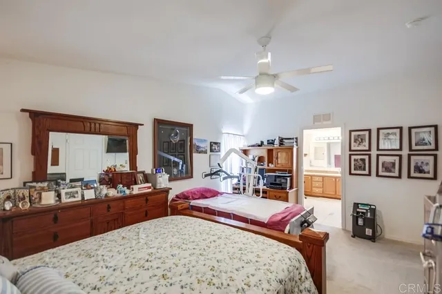 a bed room with a bed and furniture