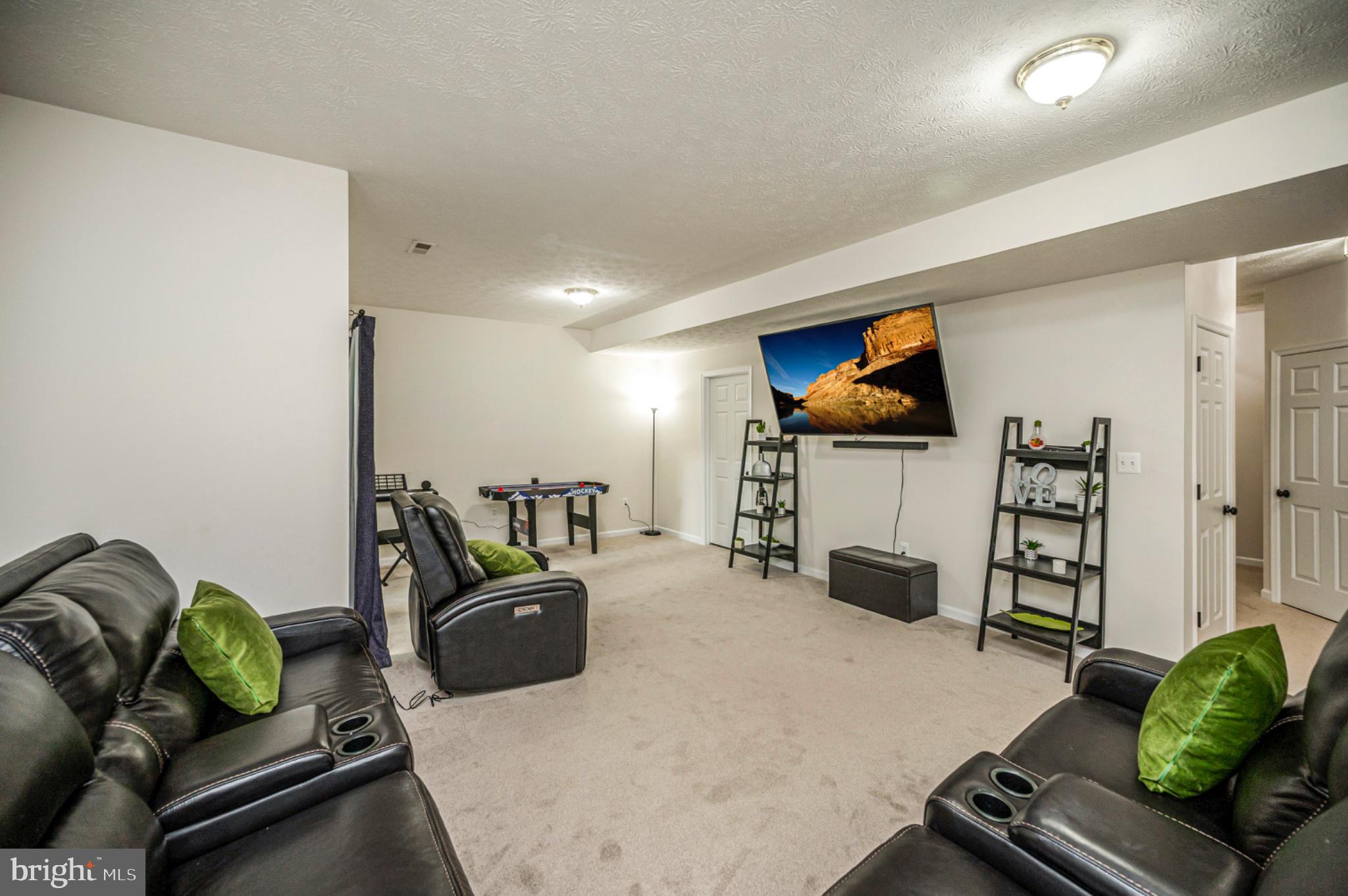 239 Toluca Road Stafford, VA 22556 - Photo 72 of 75 Spacious, modern entertainment area.