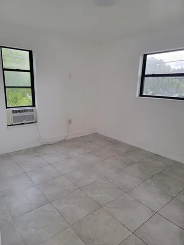 an empty room with a window