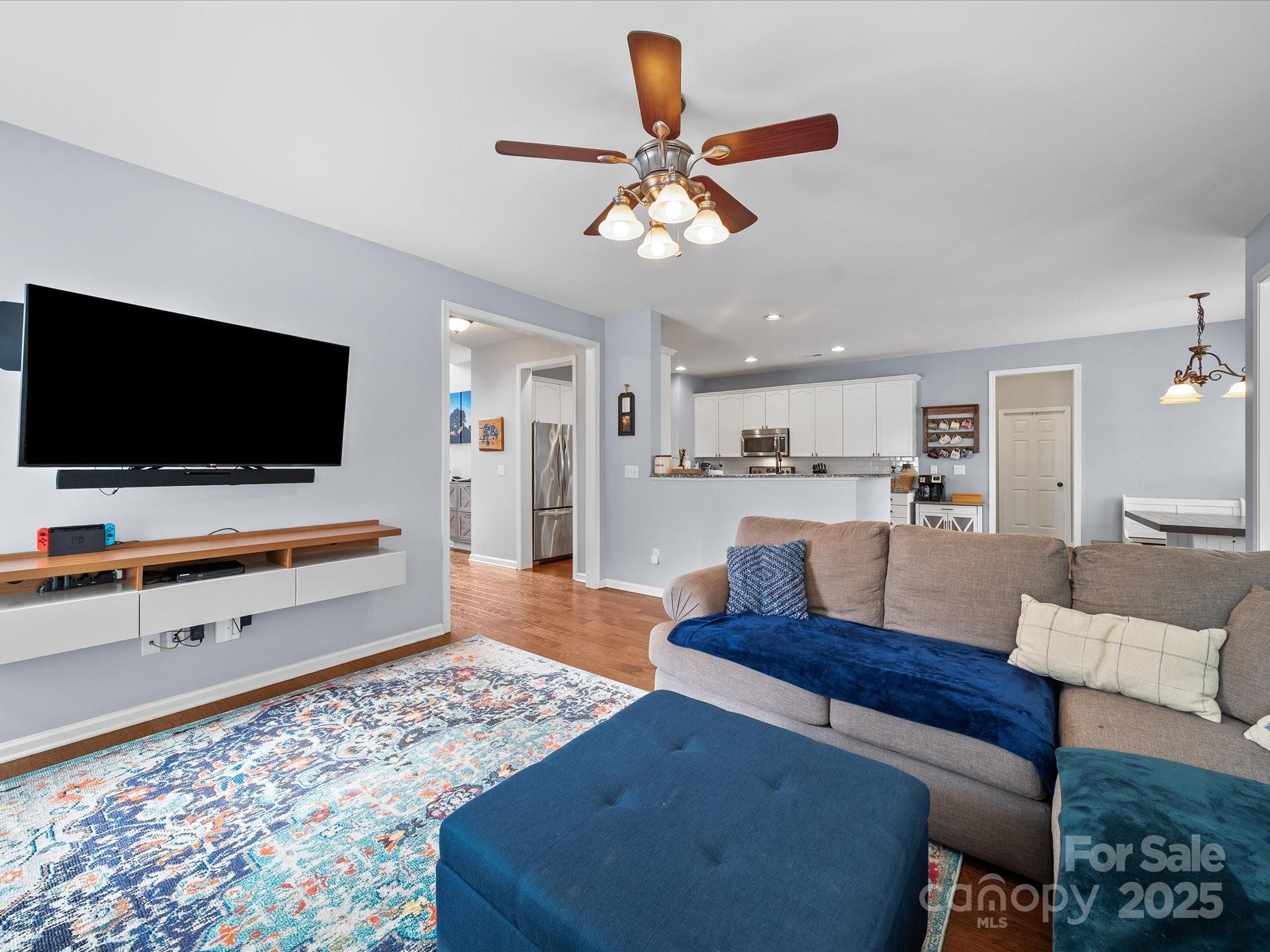 1151 Gower Street Fort Mill, SC 29708 - Photo 11 of 40 a living room with furniture and a flat screen tv