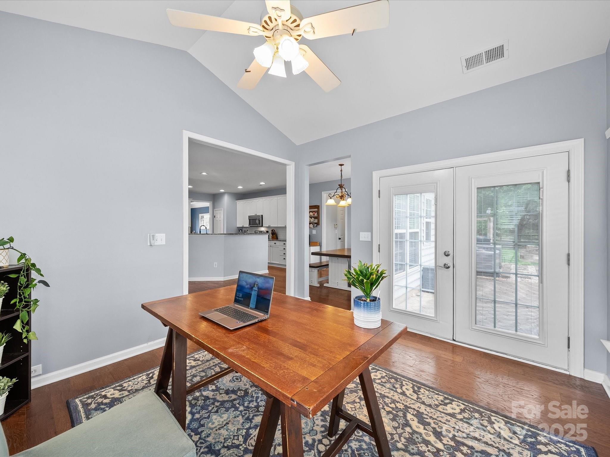 1151 Gower Street Fort Mill, SC 29708 - Photo 13 of 40 a view of a dining room with furniture window and wooden floor