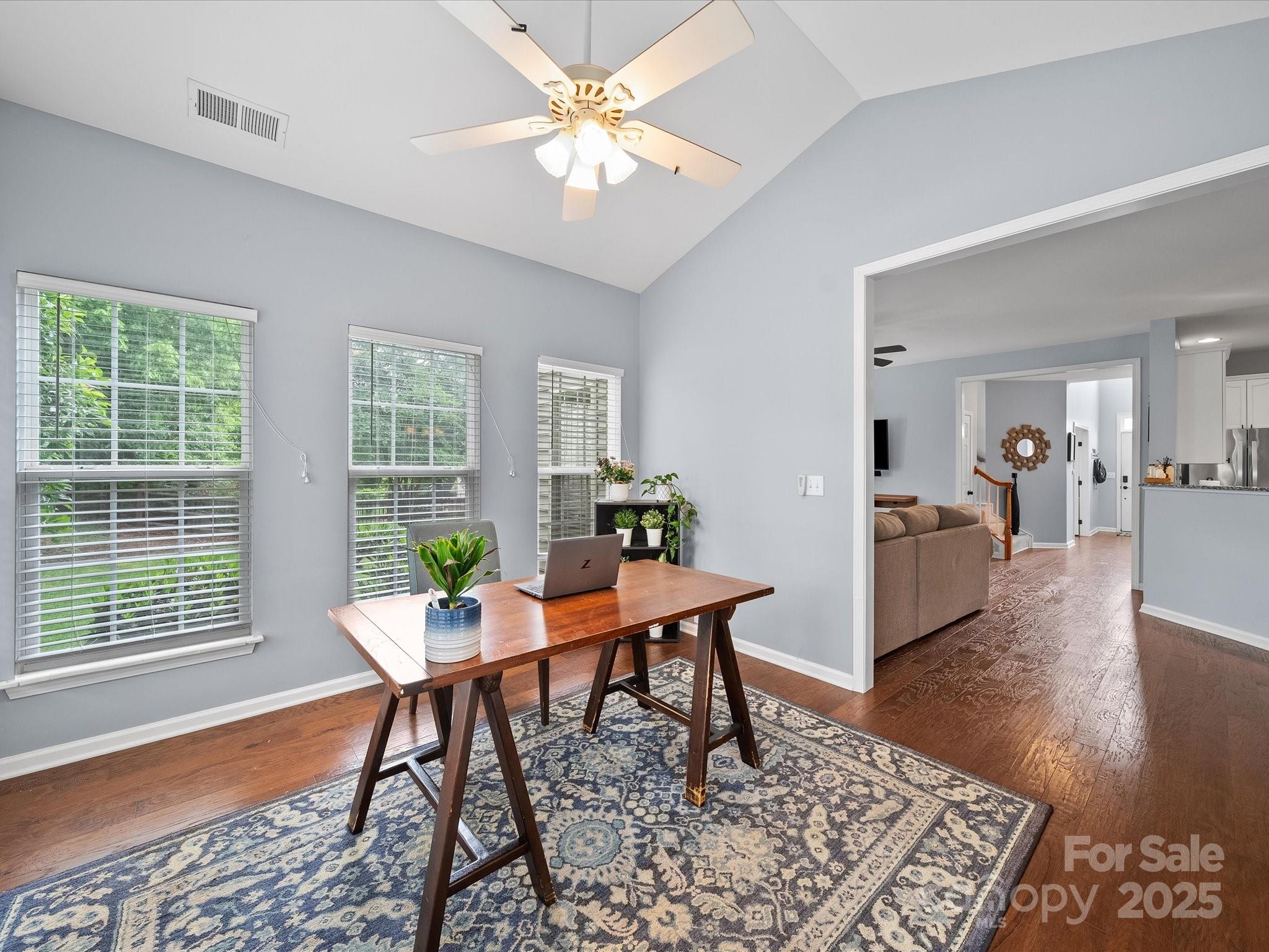 1151 Gower Street Fort Mill, SC 29708 - Photo 14 of 40 a workspace with furniture a rug and a window