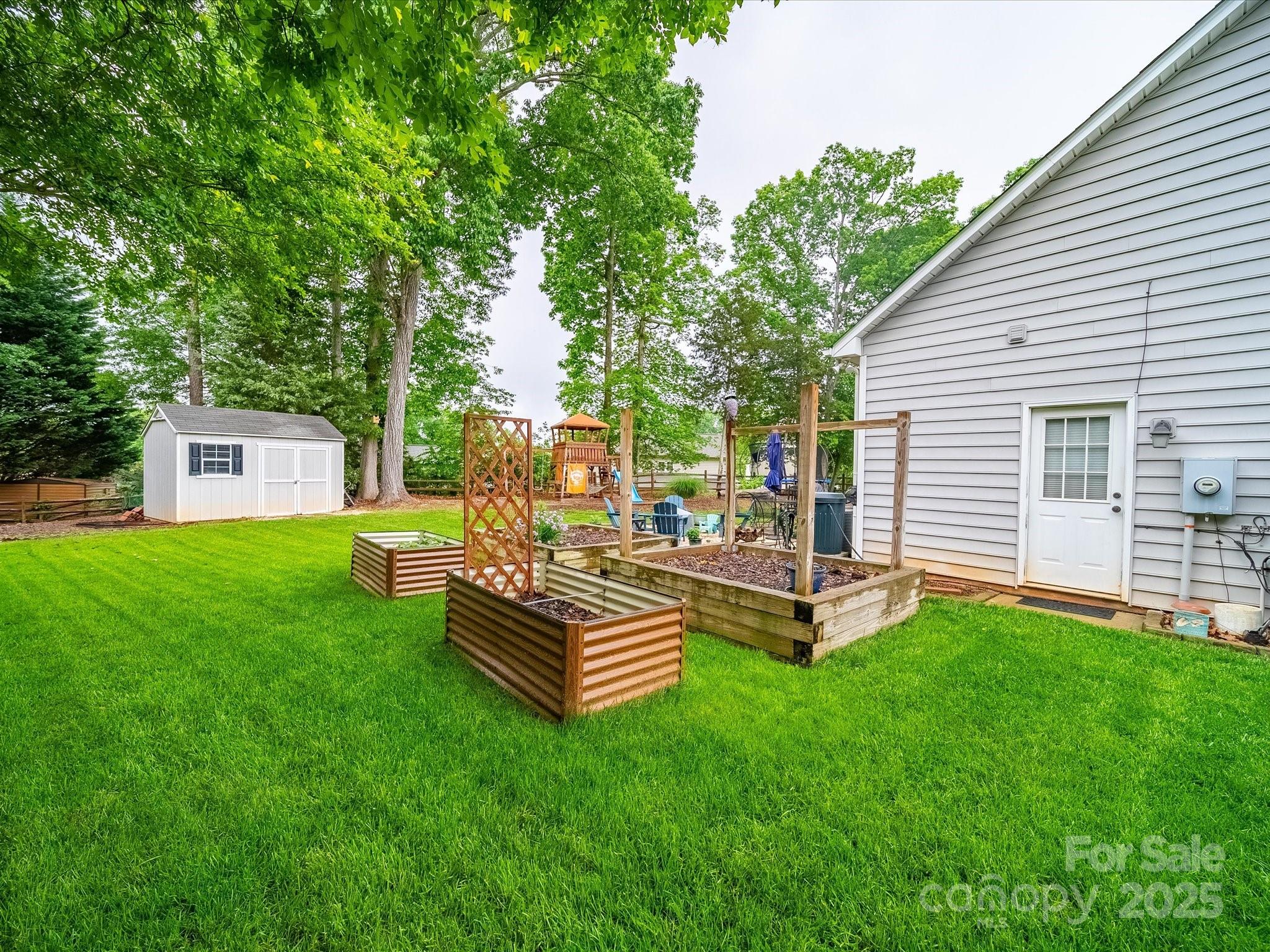1151 Gower Street Fort Mill, SC 29708 - Photo 36 of 40 a view of a house with backyard and sitting area