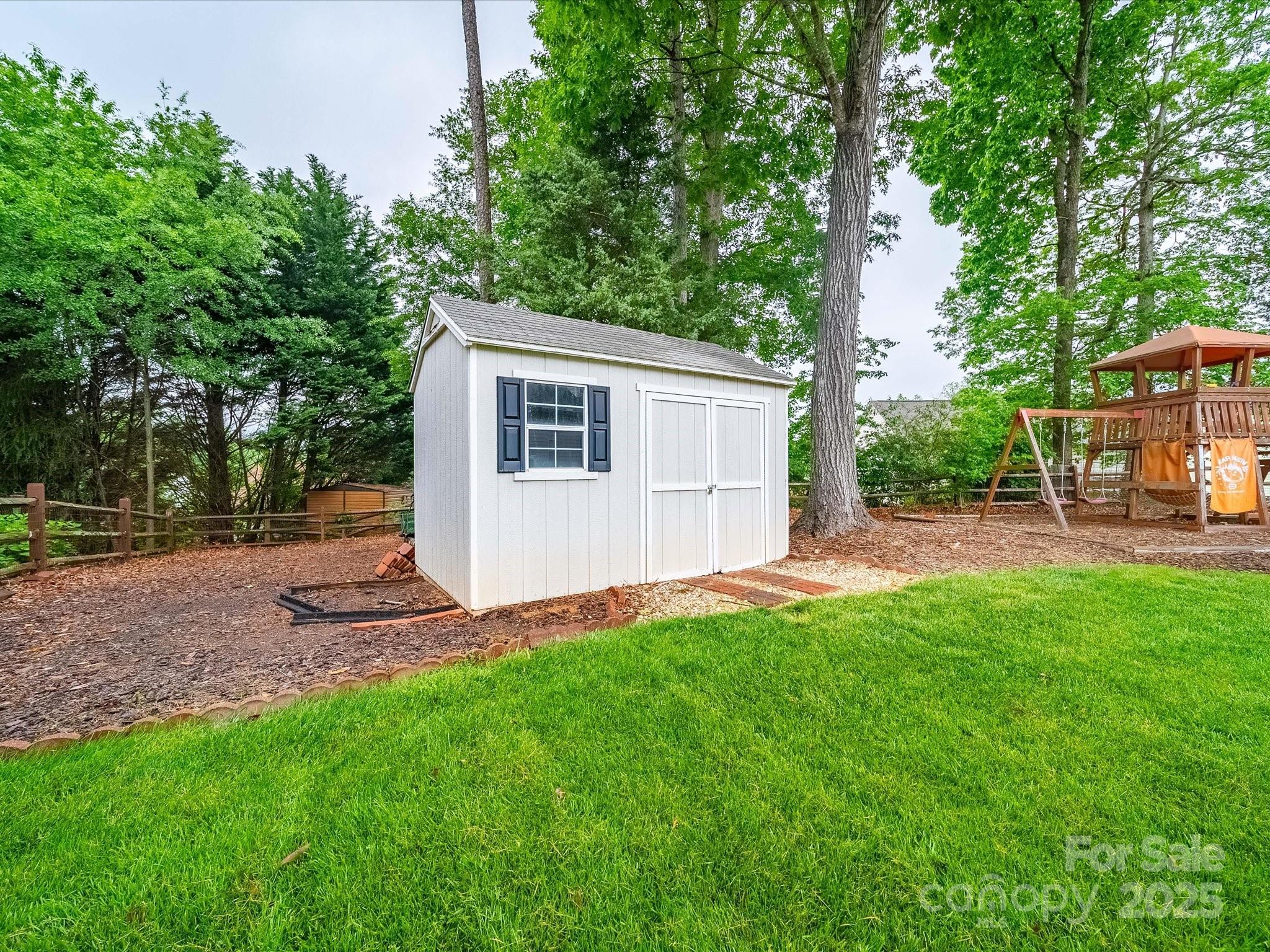 1151 Gower Street Fort Mill, SC 29708 - Photo 40 of 40 a view of a backyard with a garden and plants