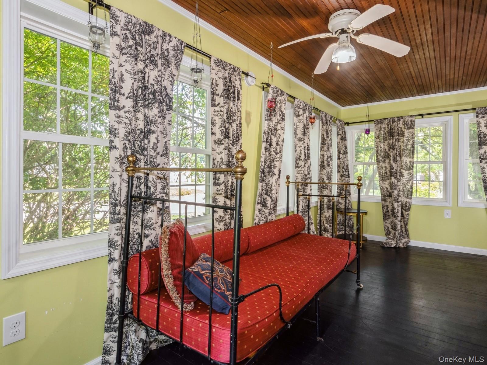 98 Jackson Street Fishkill, NY 12524 - Photo 8 of 25 Wrap around windows brings loads of sunlight into the winterized sun room.