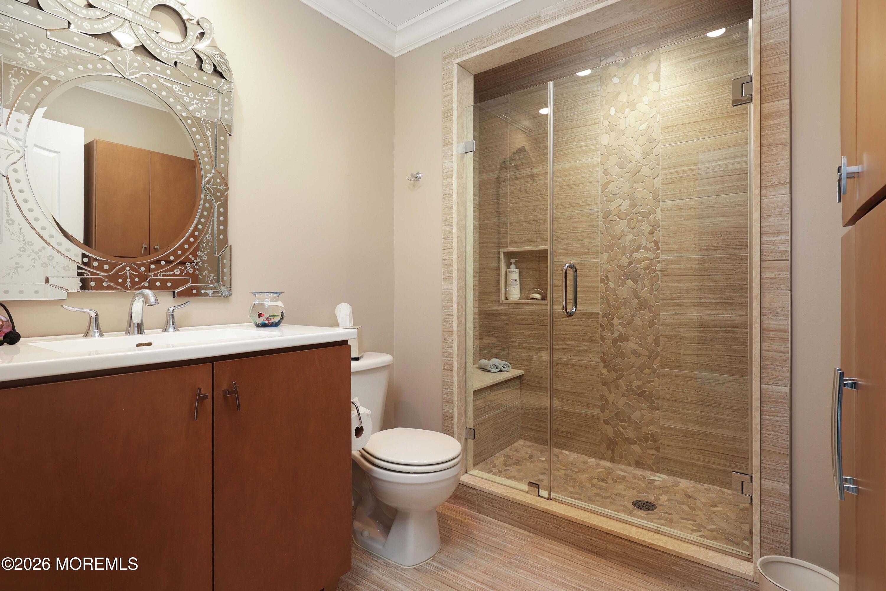 33 Chapin Avenue Red Bank, NJ 07701 - Photo 20 of 33 a bathroom with a sink a toilet and shower
