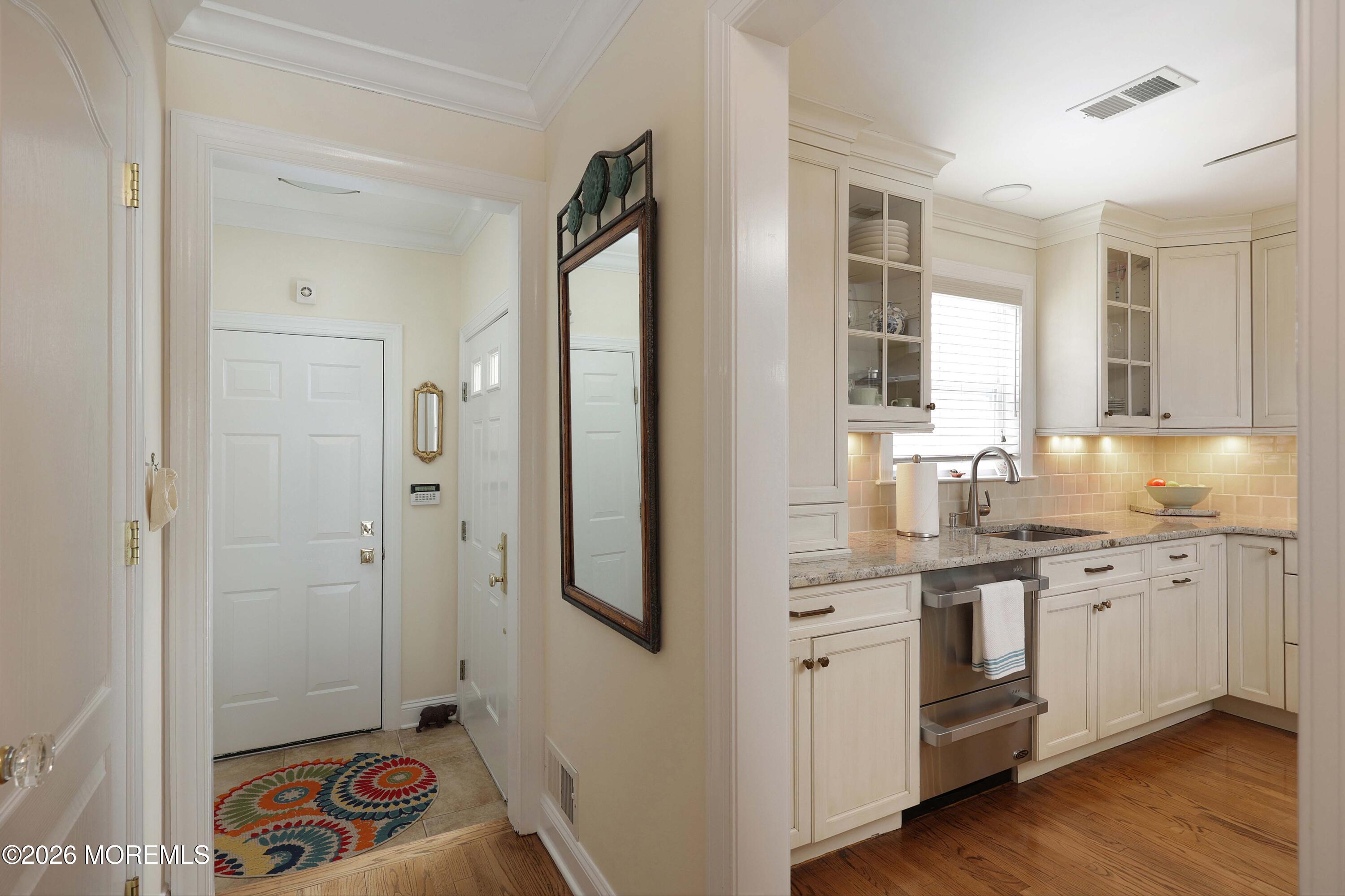 33 Chapin Avenue Red Bank, NJ 07701 - Photo 3 of 33 a spacious bathroom with a granite countertop sink mirror and a