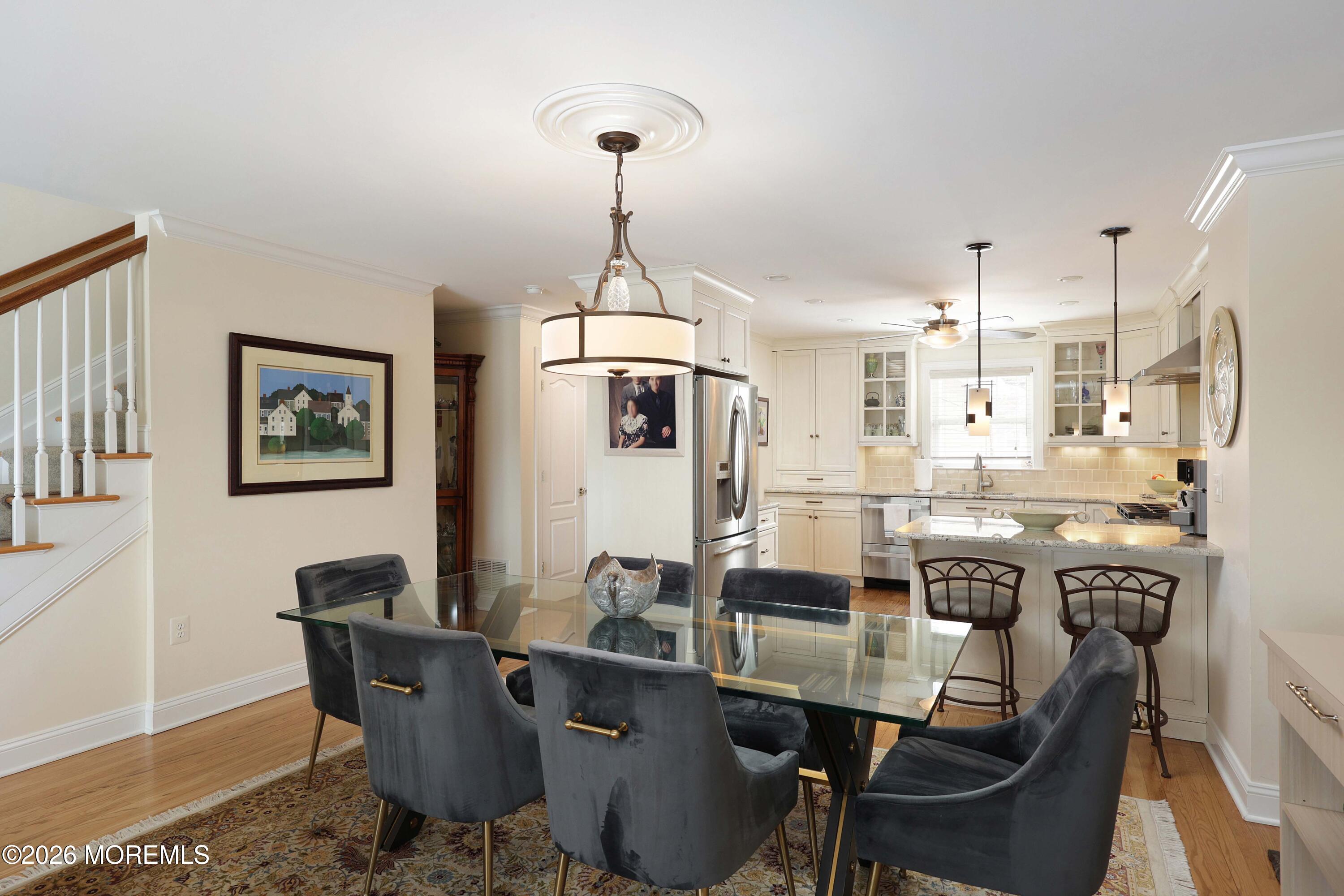 33 Chapin Avenue Red Bank, NJ 07701 - Photo 8 of 33 a dining room with furniture a chandelier and wooden floor