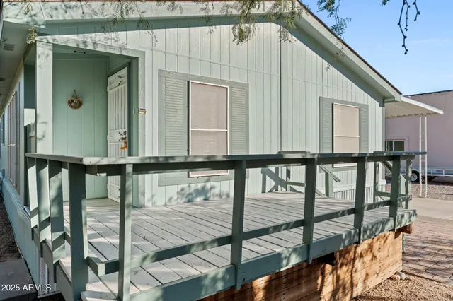 a view of balcony with wooden floor