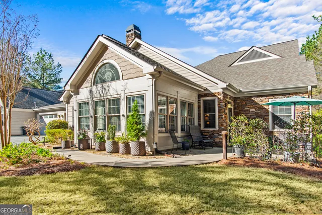 a view of house with patio