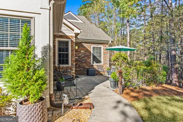 a view of house with patio