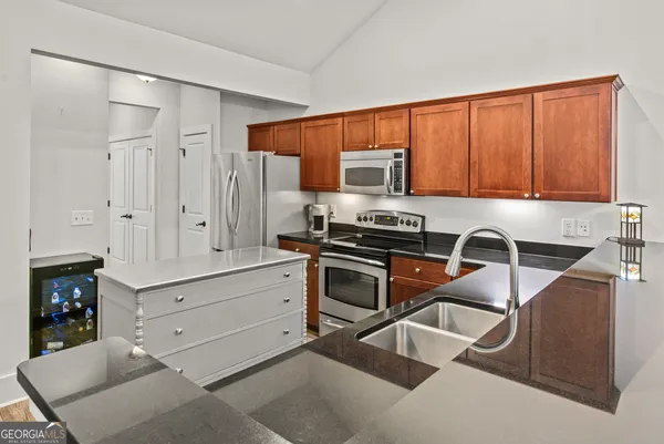 a view of kitchen and sink