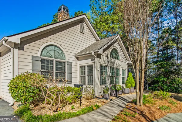 a view of an outdoor space with seating area and furniture