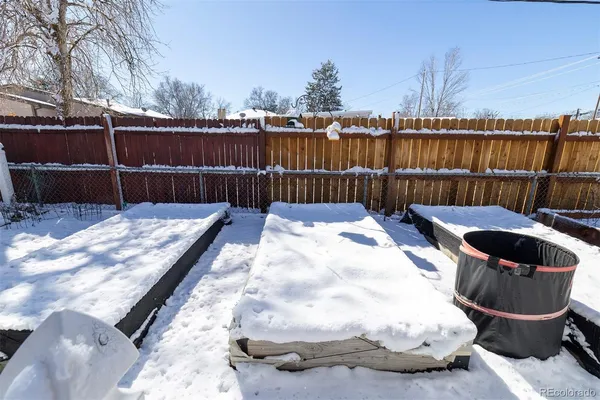 a view of a patio with a yard