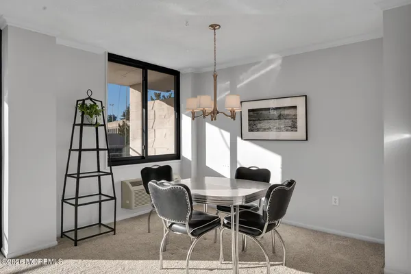 a bathroom with a sink toilet and a mirror