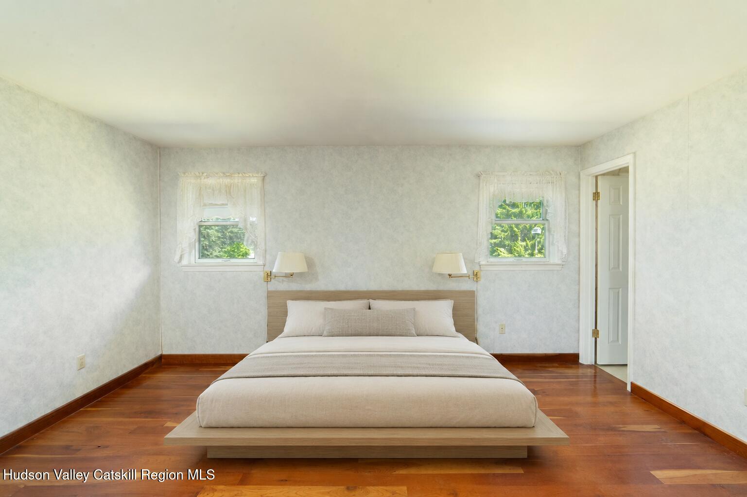 317 Mountain View Road Copake, NY 12516 - Photo 12 of 27 a bedroom with a bed and window