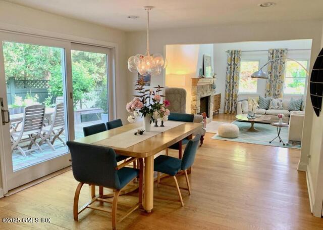 6 Irvine Road Old Greenwich, CT 06870 - Photo 7 of 15 a view of a dining room with furniture window and wooden floor