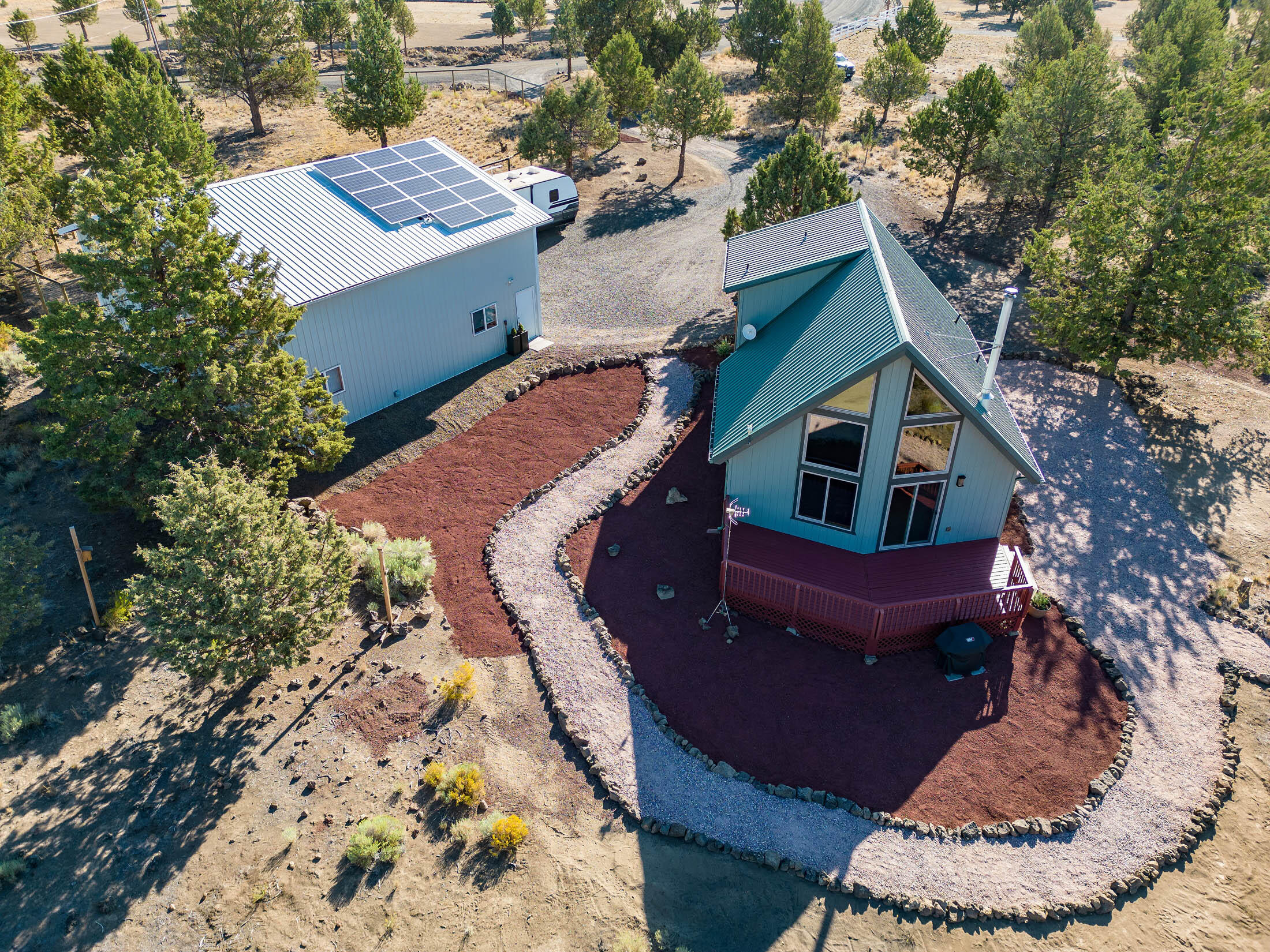 7271 Southwest Onyx Road Terrebonne, OR 97760 - Photo 1 of 43 Lovely home, both inside and out, 2 bed, 2 bath, with low maintenance inside & out. 1296 sq ft shop grid-tied solar