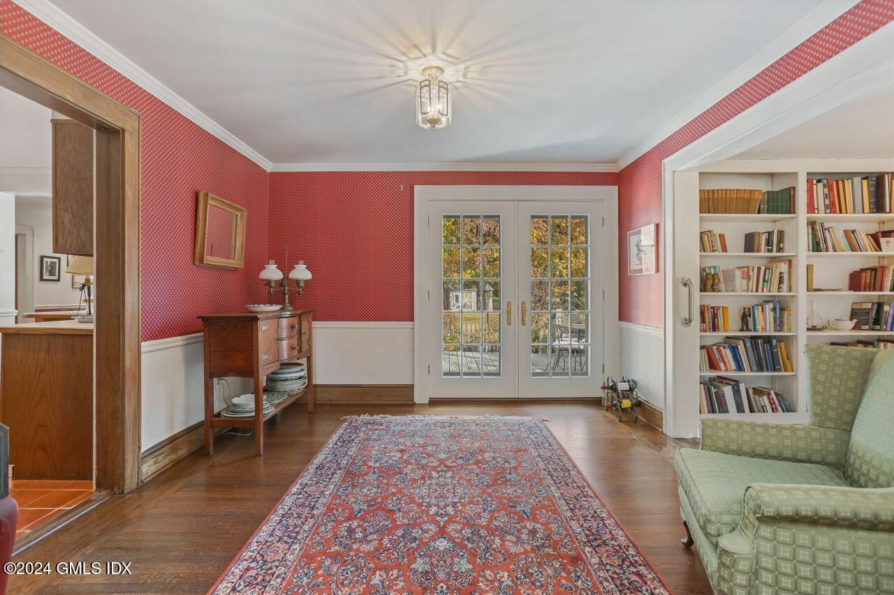 242 Taconic Road Greenwich, CT 06831 - Photo 11 of 37 a living room with furniture and a rug