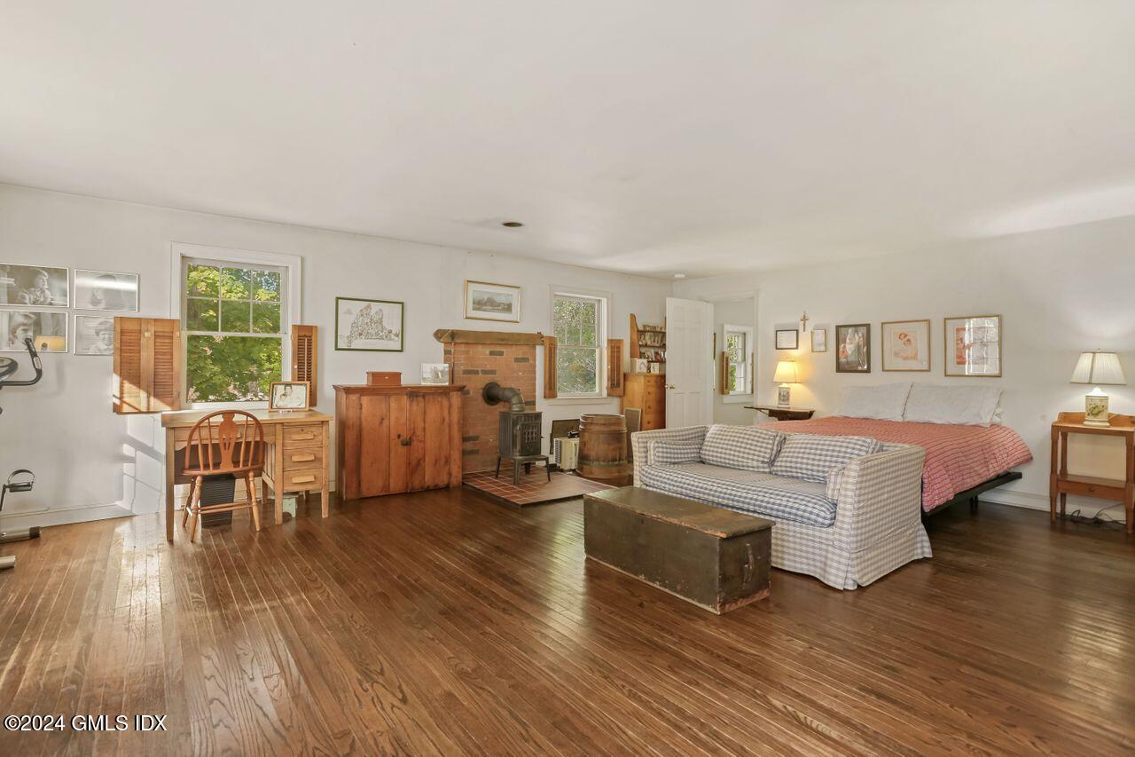 242 Taconic Road Greenwich, CT 06831 - Photo 21 of 37 a living room with furniture and a table