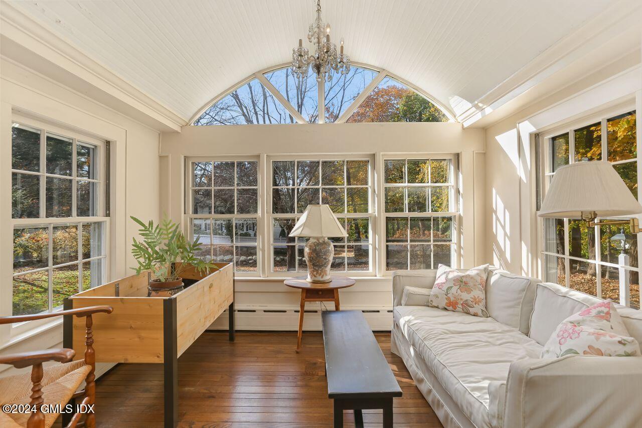 242 Taconic Road Greenwich, CT 06831 - Photo 7 of 37 a living room with furniture and a large window