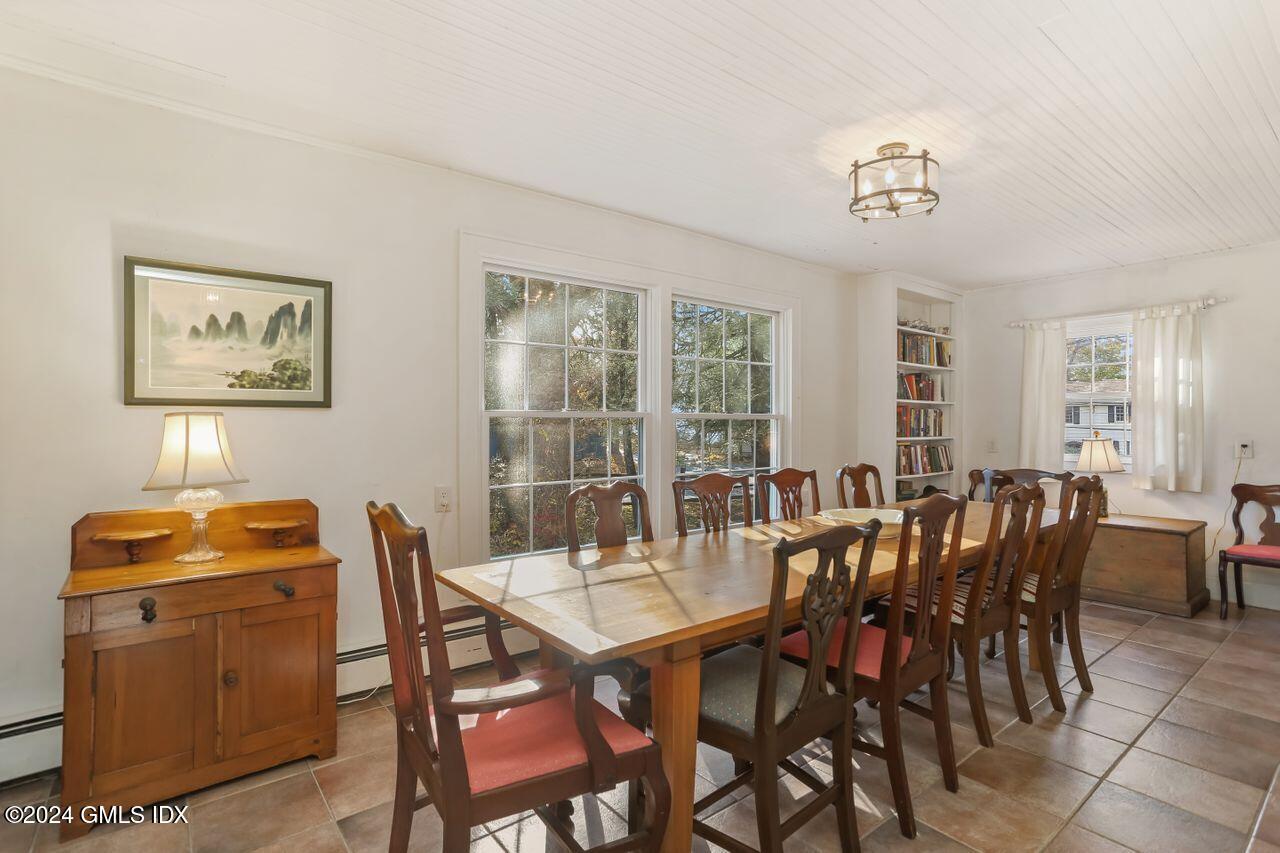 242 Taconic Road Greenwich, CT 06831 - Photo 8 of 37 a view of a dining room with furniture