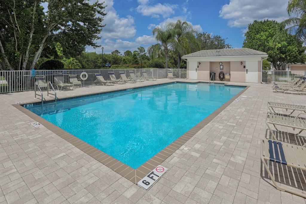 901 Addington Court, Unit 203 Venice, FL 34293 - Photo 39 of 61 a view of a house with a swimming pool