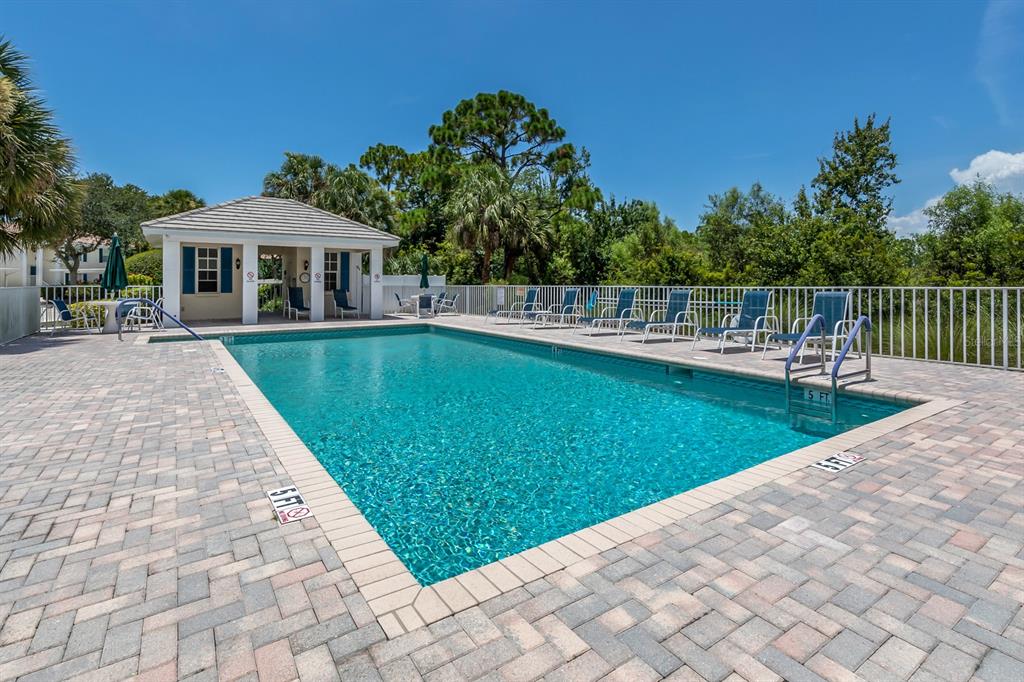 901 Addington Court, Unit 203 Venice, FL 34293 - Photo 61 of 61 a view of a house with a yard