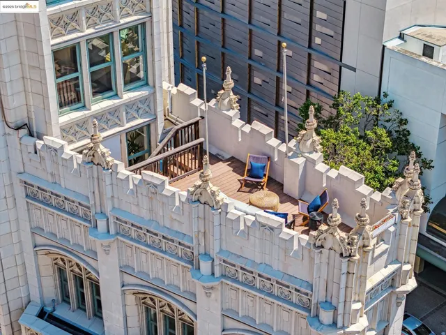a view of a city street lined with tall buildings