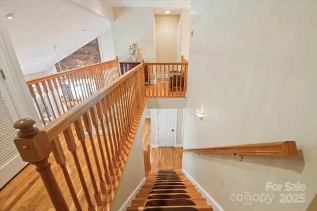 a view of a hallway with staircase