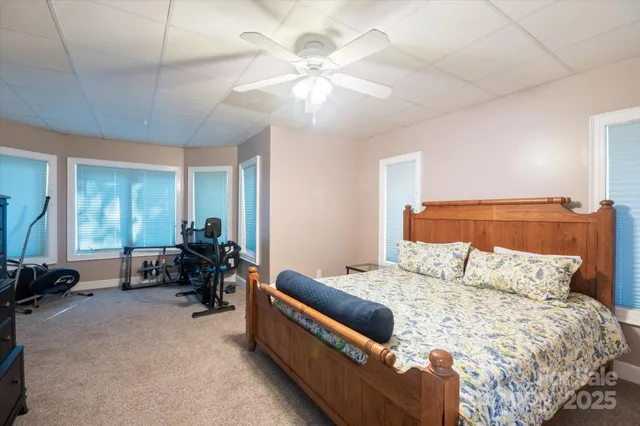 a bedroom with a bed and furniture