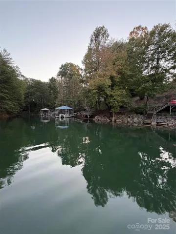 a view of lake with green space