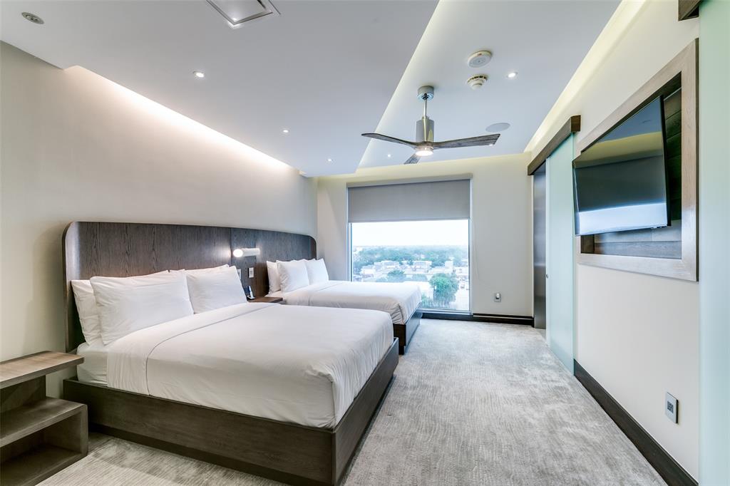 4005 Gaston Avenue, Unit PH2 Dallas, TX 75246 - Photo 15 of 33 Carpeted bedroom with recessed lighting and baseboards