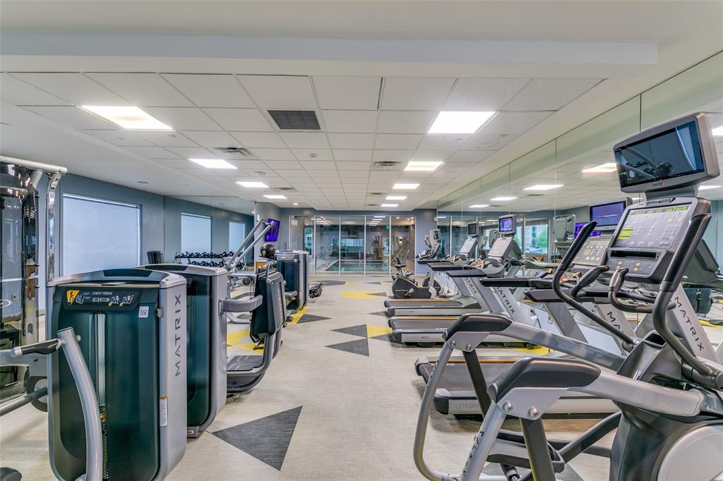 4005 Gaston Avenue, Unit PH2 Dallas, TX 75246 - Photo 27 of 33 Exercise room with a drop ceiling and carpet flooring