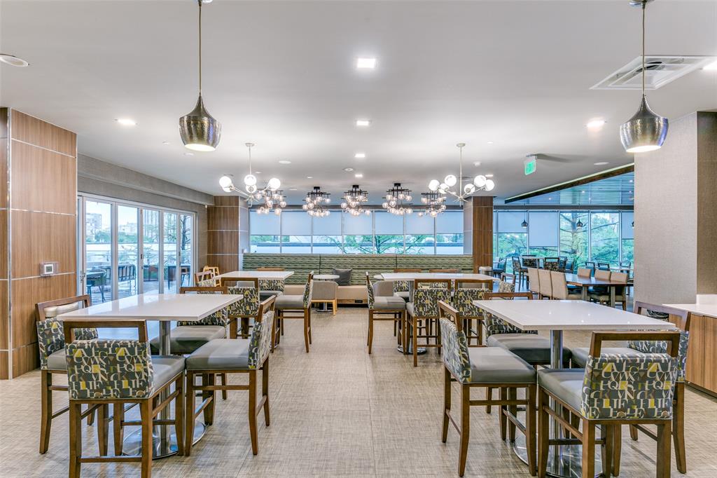 4005 Gaston Avenue, Unit PH2 Dallas, TX 75246 - Photo 33 of 33 Dining space featuring a chandelier, recessed lighting, and light carpet