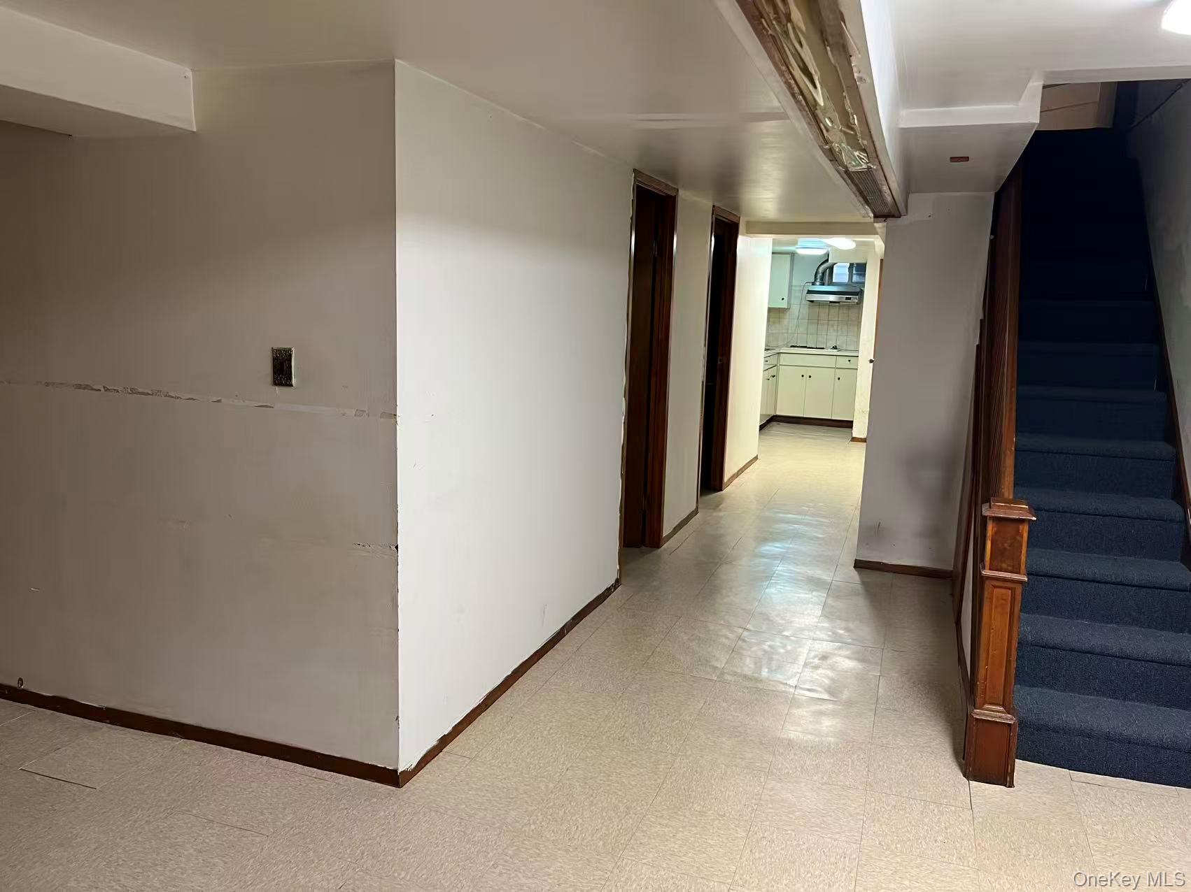 41-31 Hampton Street Queens, NY 11373 - Photo 19 of 23 a view of hallway with stairs