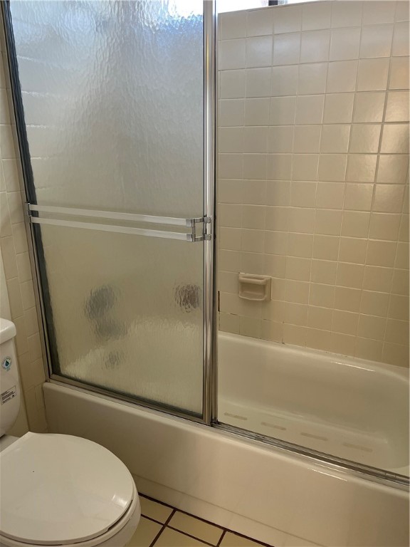 3001 Cedar Street, Unit A214 Austin, TX 78705 - Photo 12 of 17 a bathroom with a toilet and a shower