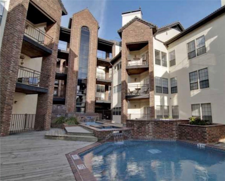 3001 Cedar Street, Unit A214 Austin, TX 78705 - Photo 17 of 17 a front view of a houses with street