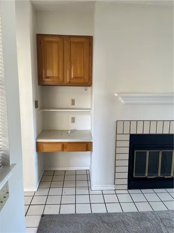 a view of kitchen with stainless steel appliances cabinets and a counter top space