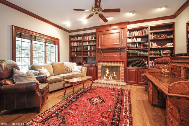 62 Spring Creek Road Barrington Hills, IL 60010 - Photo 8 of 25 a living room with furniture a rug and a large window