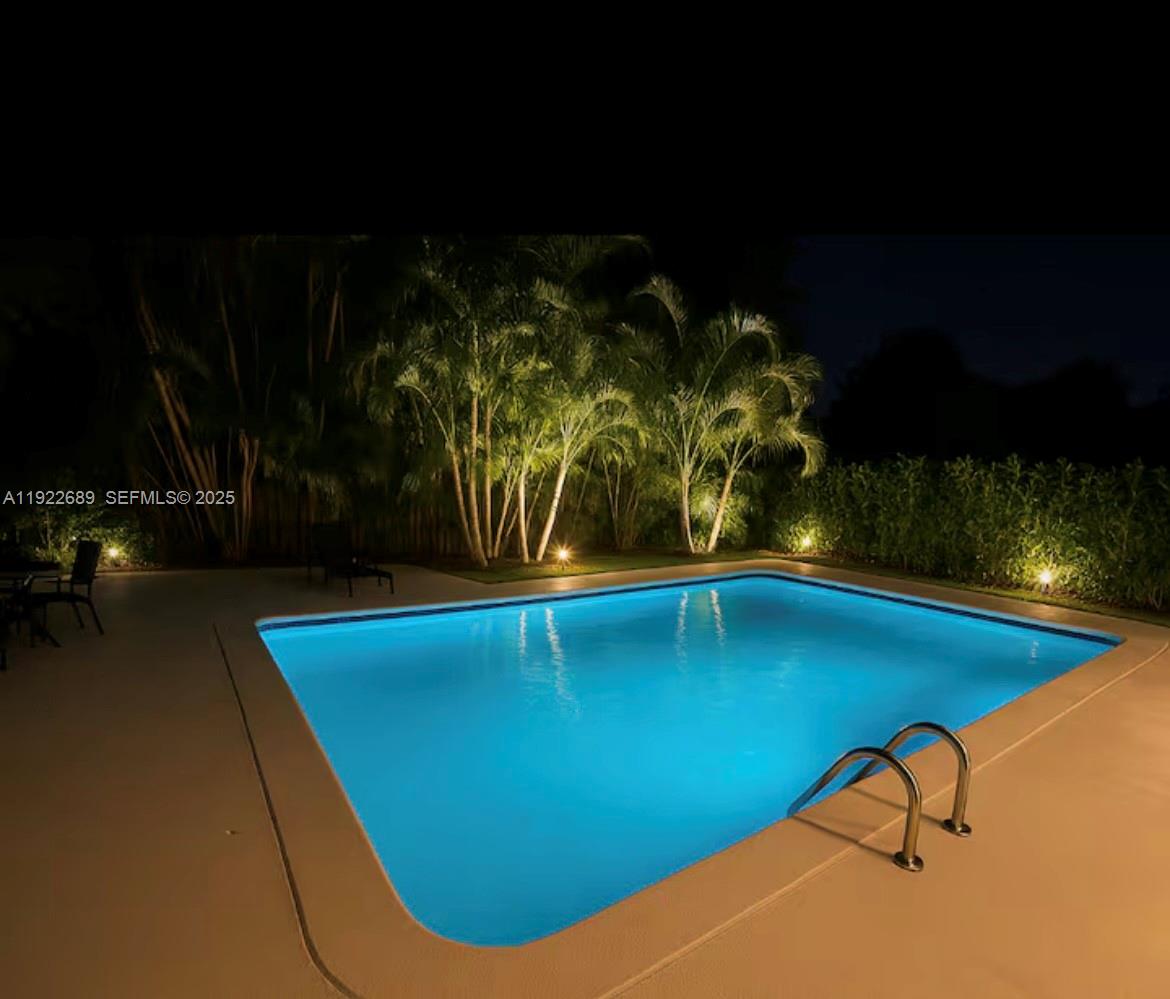 2080 Northeast 205th Street Miami, FL 33179 - Photo 2 of 24 a view of a swimming pool